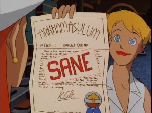 A proud Harley displaying her sane certificate from Arkham Asylum in "Batman: The Animated Series"