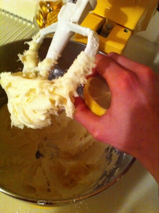 You don't need a juicer to get lemon juice - just squeeze it cut side up so that the seeds don't drop into the icing