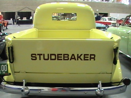 Classics and Chrome Car Show Loves Park Illinois photo of yellow Studebaker truck