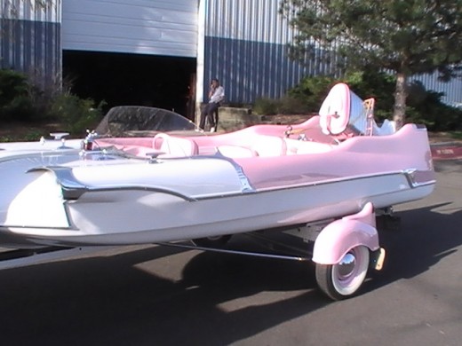 pink and white boat