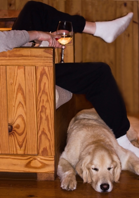 Drinking while a dog sleeps beneath your feet is often a fantastic way to pass the time.