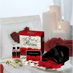 A Bed of Roses - Romantic Gift Basket Offers over 250 scented red silk rose petals and assorted sexy items make up this ultimate romantic gift Basket.