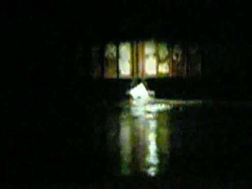 The flood level gauge succumbs to the flow of water