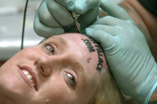 The Golden Palace Casino also paid $15,000 for the right to tattoo Kari Smith's forehead with its website address. She said she'd use the money to send her child to private school. 