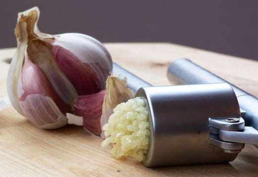 Garlic and a Garlic press