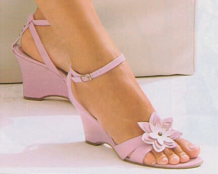 Pink sandals with matching nail polish 
