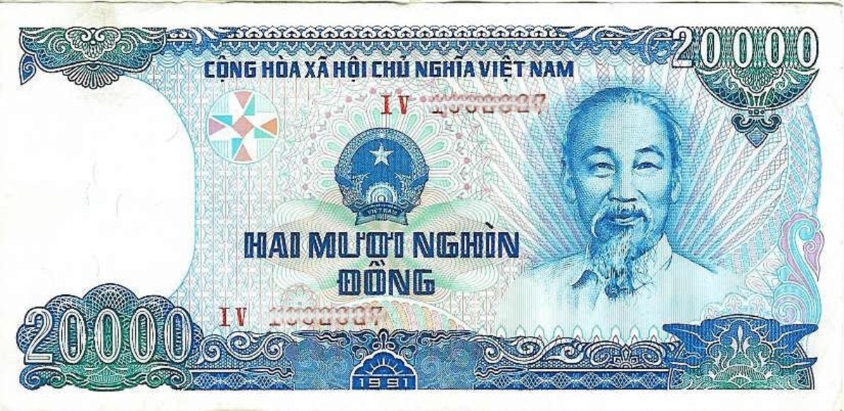 How is the Vietnamese dong revalued?