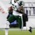 Antonio Cromartie returns a kick (AP Photo/Charles Krupa)