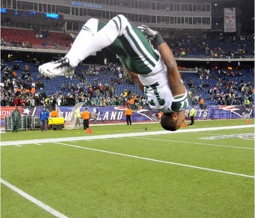 New York Jets receiver Braylon Edwards (17) does a back flip after the AFC Divisional Playoff game against the New England Patriots at Gillette Stadium in Foxboro, MA on January 16, 2011. (Kirby Lee/NFL)