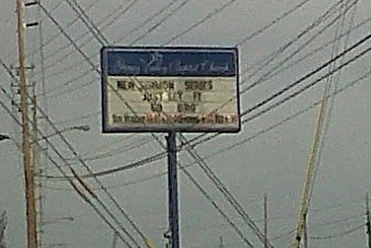 (Another high quality Blackberry pic).  Random church sign "New Sermon Series: Just Let It Go Bro"