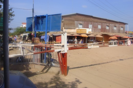 This is looking into the Cambodian town. The Cambodian guard motioned me to go thru a little metal gate and into a gated area that had a duty free shop. I didn't go into the shop...all I saw was alcohol bottles, cigarette cartons, medications, etc.