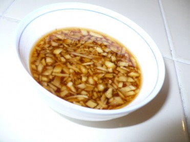 Refreshing, tangy and sweet--quite the sauce to pair with dumplings.