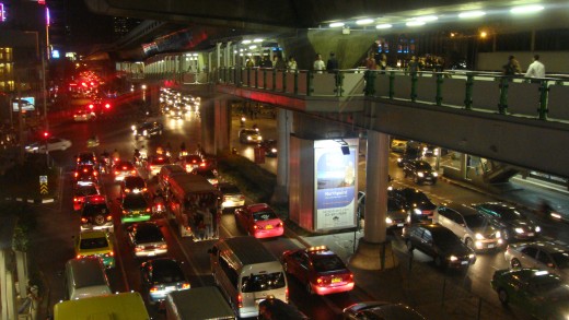 Looking down on Sukumvit street traffic from the BTS Skytrain.