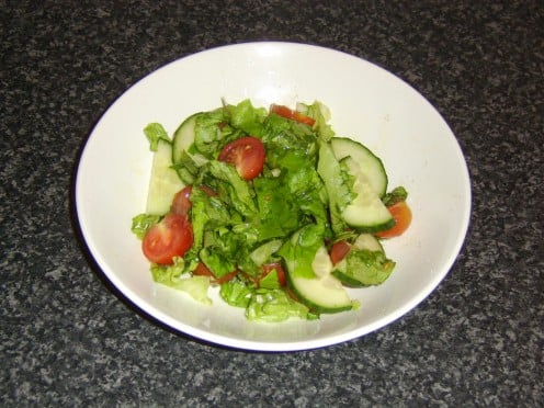 Enjoying such as a simple salad as a snack prior to visitng a restaurant can help to cut costs and be good for your health