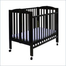 Featured is a Dream on Me portable AND convertible crib, priced at under $100.00