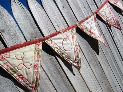 Quilted "love" bunting - photo by Moda Bake Shop