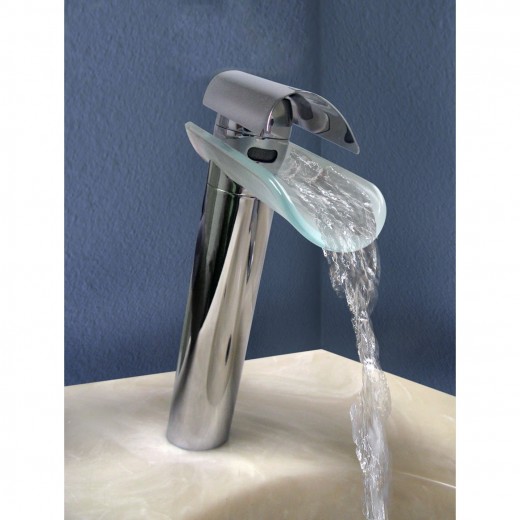 Polished chrome vessel sink faucet.