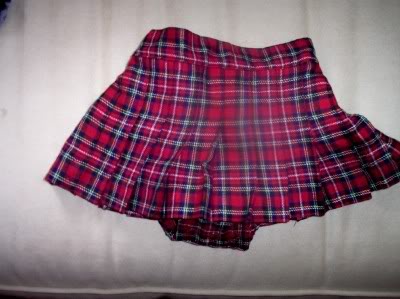 One day a brown paper package came from Eaton's. Inside was a heavy itchy plaid wool skirt. Marie said-"I wont wear it."