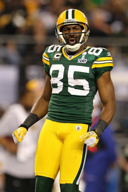 ARLINGTON, TX - FEBRUARY 06: Greg Jennings(notes) #85 of the Green Bay Packers celebrates after a first down catch in the fourth quarter during Super Bowl XLV at Cowboys Stadium on February 6, 2011 in Arlington, Texas. (Photo by Jamie Squire/Getty Im