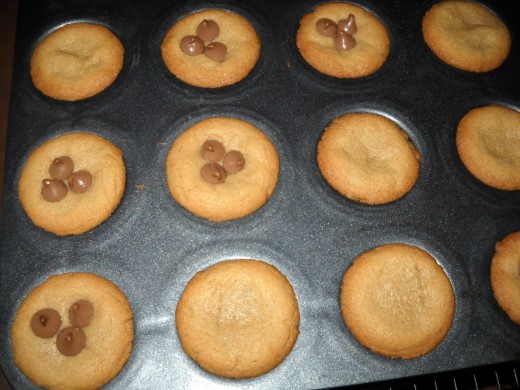Finished peanut butter cookies with milk chocolate chips. Delicious!