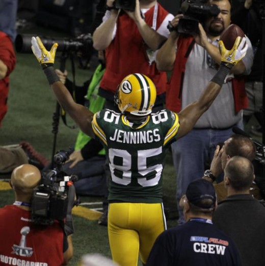 Green Bay Packers' Greg Jennings celebrates his touchdown during the second half of the NFL Super Bowl XLV football game against the Pittsburgh Steelers Sunday, Feb. 6, 2011, in Arlington, Texas. (AP Photo/Lynne Sladky)