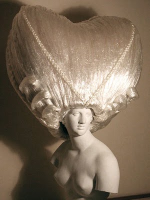 An eccentric cling wrap wig by Kate Cusack