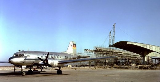 An Illushin Il-14 of 'Interflug', and building work at Berlin-Schoenefeld in 1961