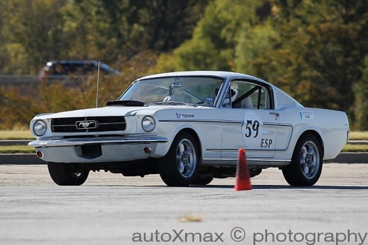 A mid-60's Ford Mustang autocrossing