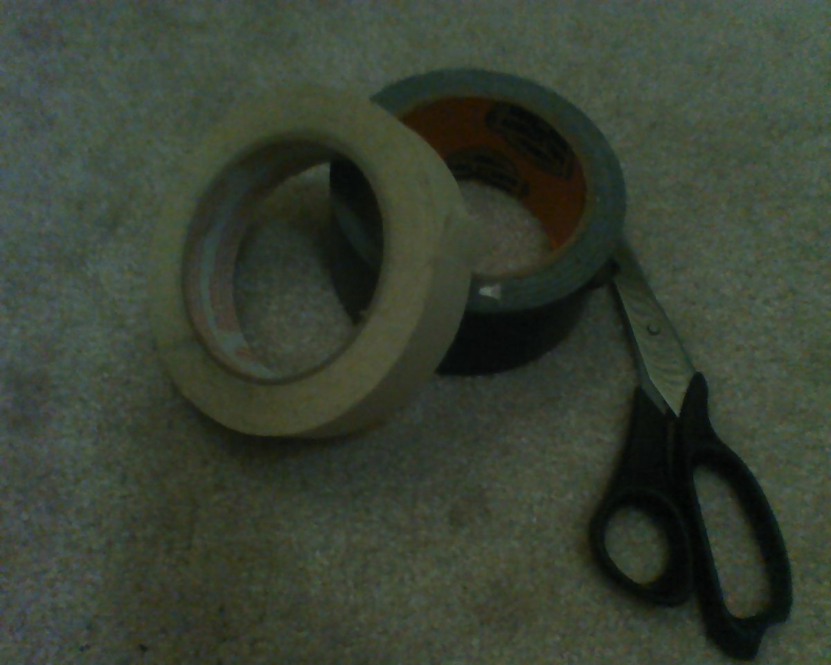 scissors with masking tape and black gorilla tape for the chipmunk's stripes