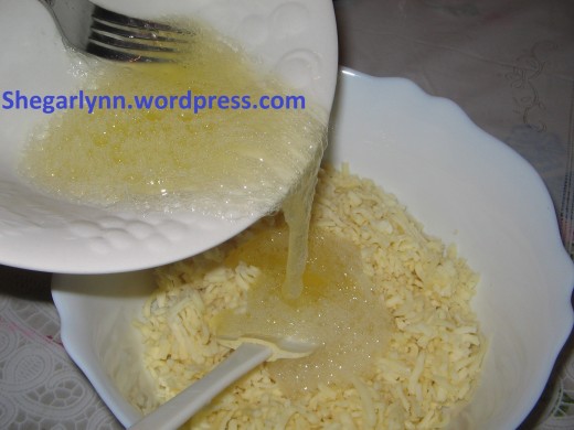 Mixing the white eggs with cheese