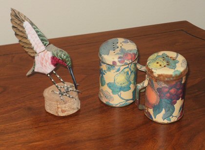 A handmade , hand-painted hummingbird and salt and pepper set that my dad and I got my mum on mother's day 1994.
