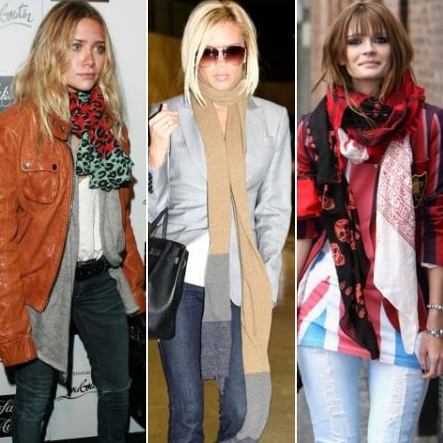 Three attractive females all wearing long scarves