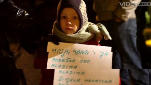 Child carrying transparent: MY GRANDMA AND ME ARE SUPPORT TO THE PROTESTERS: LONG LIVE CROATIA