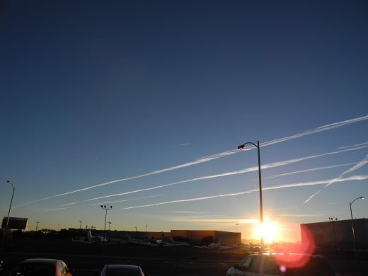 Pencil Thin Chemtrails Glistening in the Morning Sun like a freshly created Spider's Web (later morph into the HUGE Chemical Clouds shown in the 1st two pics).