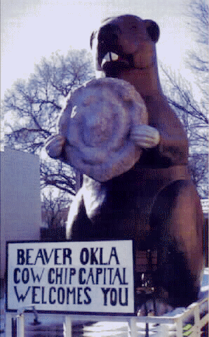 It's a giant beaver holding a cow chip. Duh.