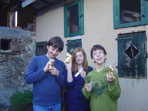 Three happy kids with their prizes