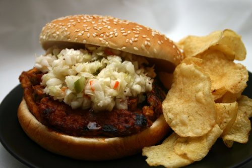 Barbecue tempeh sandwich with cold-slaw and potato chips