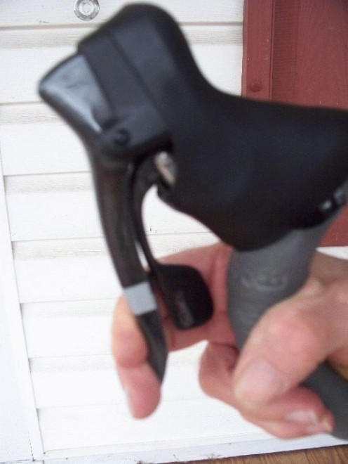 Descend with hands on the levers - in the "hooks".