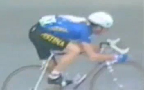 The right pedal is up for a turn, and lean, to Kelly's right.
