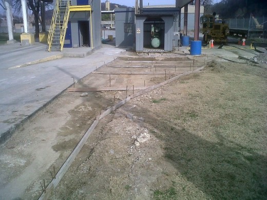 For some reason, my Boss wanted to be productive today, sooo.....we formed up some spots where we plan on pouring some concrete...at some point.