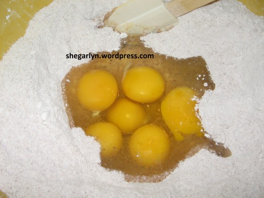 Make a well and add eggs, oil, and others ingredient on it. Make a well and add eggs, oil, and others ingredient on it.