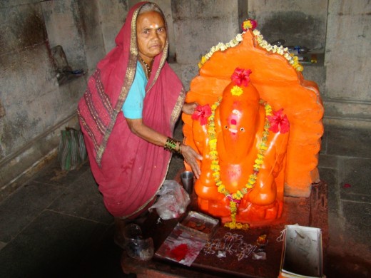 The idol & the priestess of Lord Ganesha near the top of the hill.
