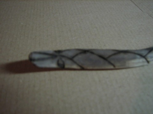 I also burned in some eyes with very simple lines.