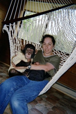 Bow and I on a string hammock that replaced the green and white striped hammock. This one also no longer exists because Bow destroyed it , too, years ago.