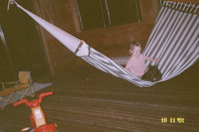 Sword and Teyman on the green and white striped hammock that we no longer have because Bow destroyed it. That carpet underneath the hammock also no longer exists because Bow destroyed it.