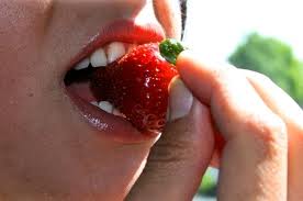 Eating a strawberry uses senses of taste...and of touch