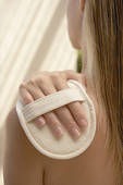 If you like your back scratched, try a dry loofa sponge . . . it's heaven!