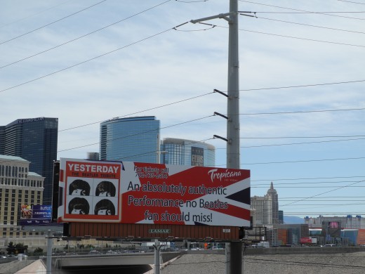 Chemtrail Skies covering the complete Las Vegas Strip.  An Advertisement for the Beatles Show faces the Rio Parking Lot... the area where I filmed this.