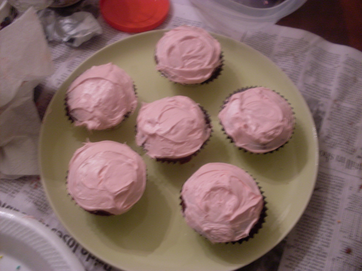 Red velvet cupcakes with strawberry frosting