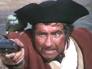 Robert Newton as Long John Silver, who I might possibly not have run away to sea with!